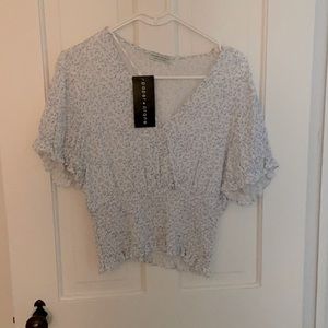 Never worn, cute summer top.